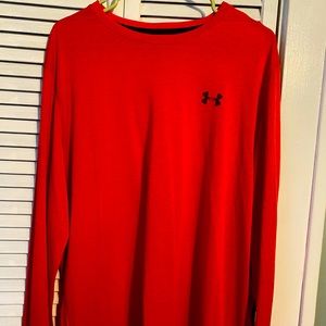Two men’s Underarmour long sleeve shirts